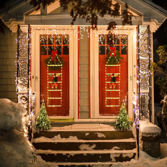 Escalera con luces led para decoración navideña con Papá Noel trepador